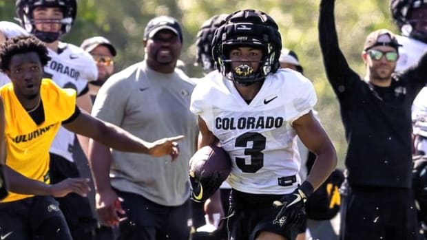 Colorado's Dylan Edwards running down the sidelines in Fall Camp